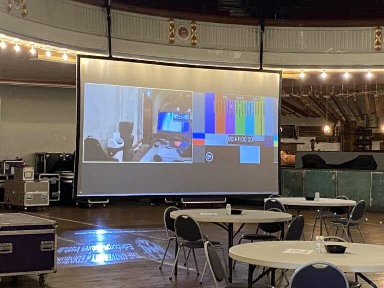 Image of screen projected in a meeting room 